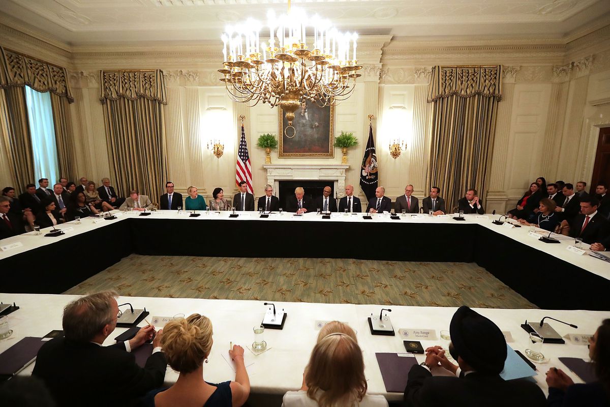 U.S. President Donald Trump welcomes members of his American Technology Council in the State Dining Room of the White House June 19, 2017 in Washington, DC. According to the White House, the council's goal is 'to explore how to transform and modernize gov