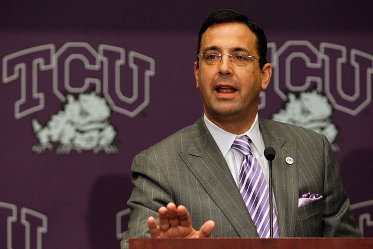 TCU Athletic Director Chris Del Conte indicates with his hand how many millions of dollars the Big East says we owe them. (Photo by Tom Pennington/Getty Images)