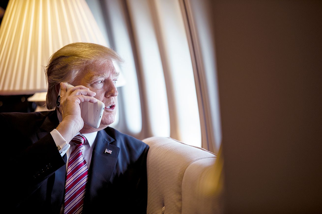 Trump talks on a phone