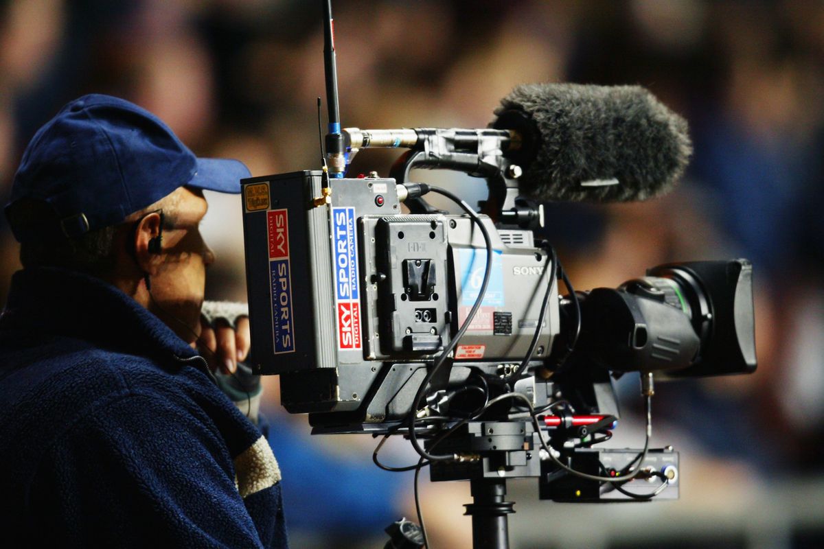Sky Sports TV cameraman filming