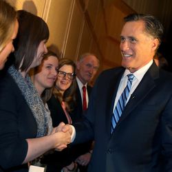 Former governor of Massachusetts Mitt Romney greets audience members as he exits the auditorium after addressing the Hinckley Institute of Politics at the University of Utah on the state of the 2016 presidential race in Salt Lake City on Thursday, March 3,  2016.  
