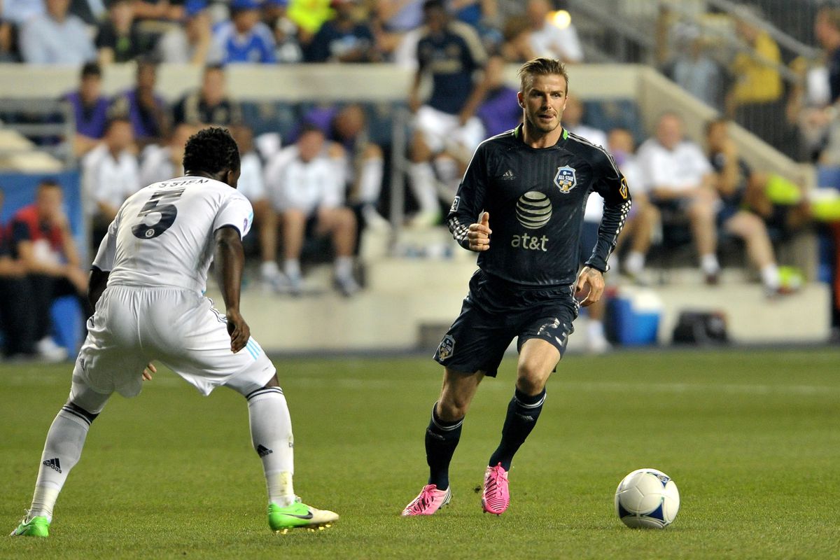 CHESTER, PA - JULY 25: David Beckham #23 of MLS All-Stars handles the ball against Michael Essien #5 of Chelsea during the 2012 AT&T MLS All-Star Game at PPL Park on July 25, 2012 in Chester, Pennsylvania.  (Photo by Drew Hallowell/Getty Images)