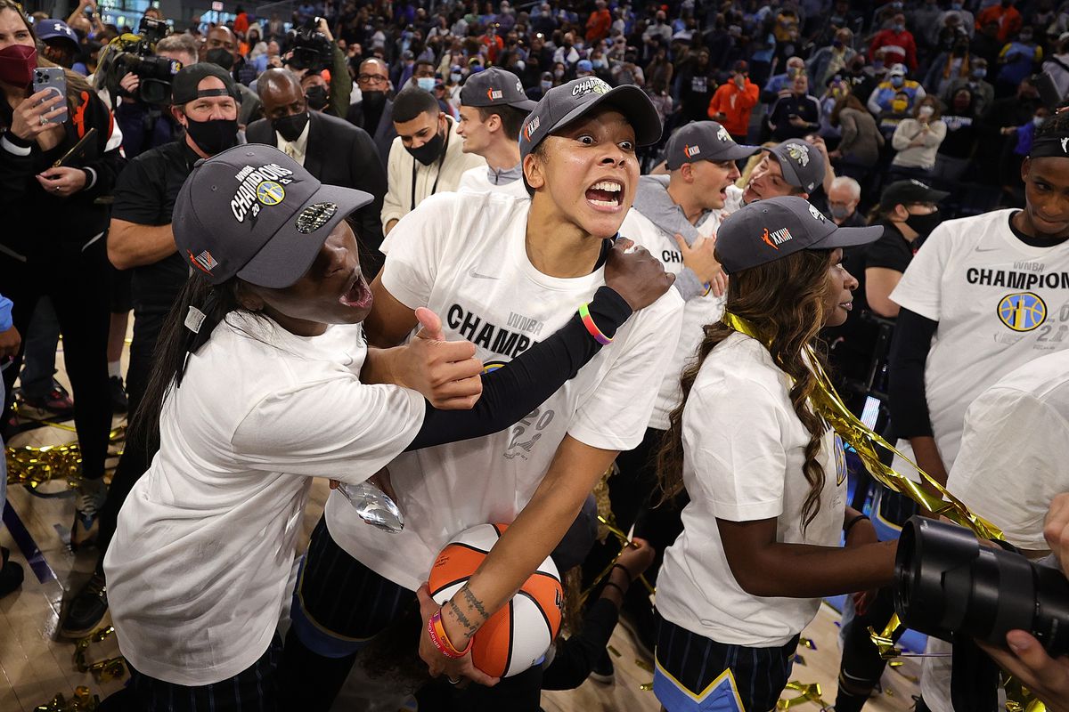 Candace Parker #3 and Kahleah Copper #2 of the Chicago Sky celebrate after defeating the Phoenix Mercury in Game Four of the WNBA Finals to win the championship at Wintrust Arena on October 17, 2021 in Chicago, Illinois.