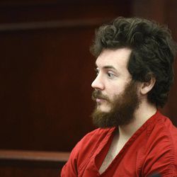 FILE - In this March 12, 2013 file photo, Aurora, Colo., theater shooting suspect James Holmes sits in the courtroom during his arraignment in Centennial, Colo. On Monday, April 1, 2013, prosecutors said they will seek the death penalty against Holmes. 