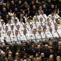 Hundreds of law enforcement officers attend the funeral service for Utah County Sheriff's Sgt. Cory Wride at the UCCU Events Center at Utah Valley University in Orem on Wednesday, Feb. 5, 2014. Wride was killed in the line of duty on Thursday while conducting what initially appeared to be a routine traffic stop. Wride was a deputy with the sheriff's office for 19 years and leaves behind a wife, five children and eight grandchildren.