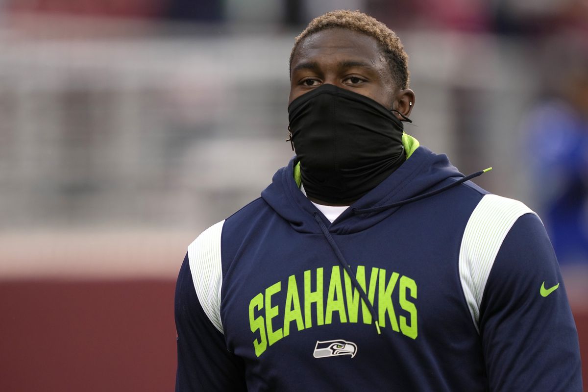 DK Metcalf #14 of the Seattle Seahawks looks on during warmups before the game San Francisco 49ers at Levi’s Stadium on September 18, 2022 in Santa Clara, California.