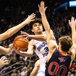 Brigham Young Cougars guard Elijah Bryant (3) wheels a shot against St. Mary's Gaels guard Tanner Krebs (00) and St. Mary's Gaels center Jock Landale (34) as the BYU Cougars take on the Saint Mary's Gaels in the Marriott Center in Provo on Saturday, Dec. 30, 2017.