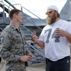 NFL Pro Bowler Nick Mangold, right, speaks with USAF Master Sergeant Jeffery Braselton during the Airman for a Day event sponsored by USAA, the Official Military Appreciation Sponsor of the NFL on Wednesday, Jan. 21, 2015 in Glendale, Ariz.