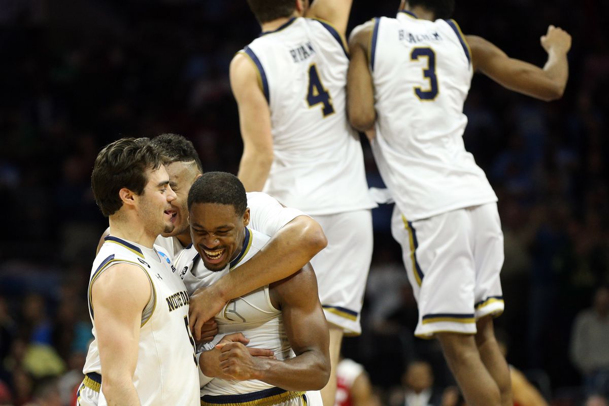 Mar 25, 2016; Philadelphia, PA, USA; Notre Dame Fighting Irish guard Demetrius Jackson (center) reacts with teammates after defeating the Wisconsin Badgers during the second half in a semifinal game in the East regional of the NCAA Tournament