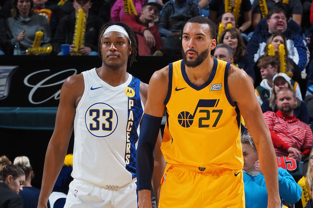 Myles Turner of the Indiana Pacers and Rudy Gobert of the Utah Jazz look on during the game on November 27, 2019 at Bankers Life Fieldhouse in Indianapolis, Indiana.&nbsp;