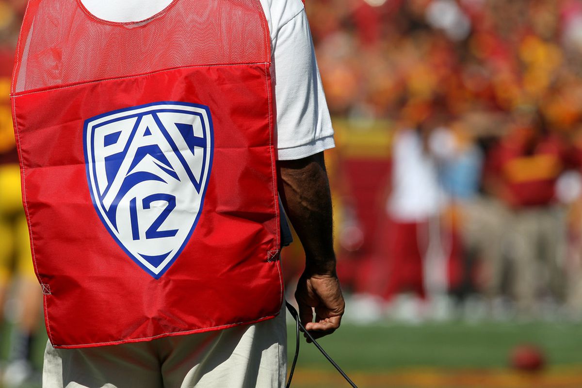 LOS ANGELES - SEPTEMBER 3:   A sideline official wears a vest with the logo for the Pac 12 conference (Photo by Stephen Dunn/Getty Images)