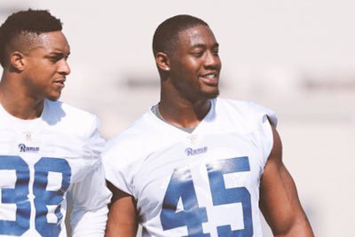 Los Angeles Rams EDGE Ogbonnia Okoronkwo (#45) with S Steven Parker (#38) during organized team activities.