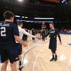 Brigham Young Cougars guard Nick Emery (4) fives teammates as BYU falls to Valparaiso 72-70 in NIT semifinal action at Madison Square Garden in New York City Tuesday, March 29, 2016.