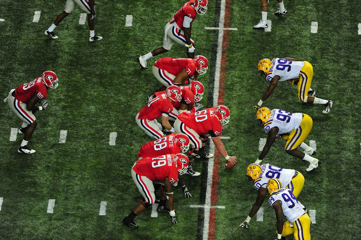 Aaron Murray of the Georgia Bulldogs calls a play against the LSU Tigers during the SEC Championship Game at the Georgia Dome on December 3, 2011 in Atlanta, Georgia.