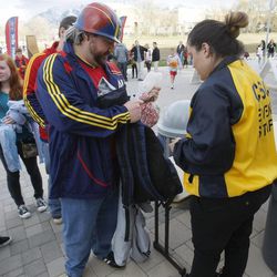Security guards take tickets and search coats and bags as fans enter the stadium to watch Real Salt Lake and Chivas USA play Saturday, April 20, 2013 at Rio Tinto Stadium.