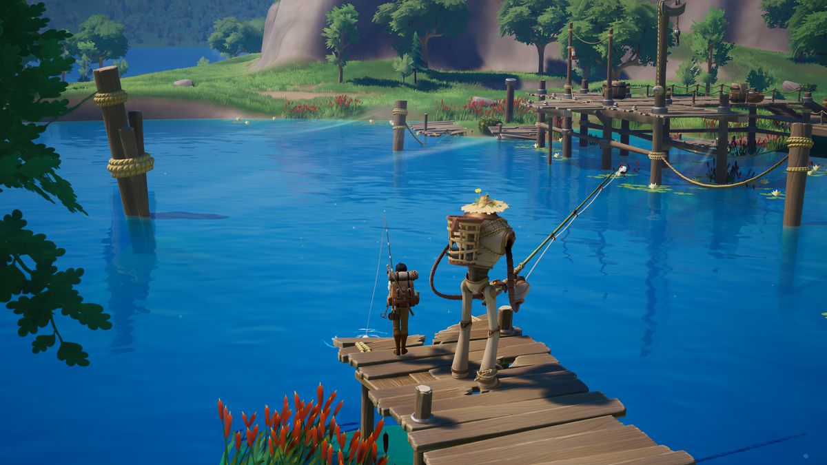 A player fishes in Palia next to their robot companion, a tall and lanky figure. The waters are calm and still, with trees lining the banks.
