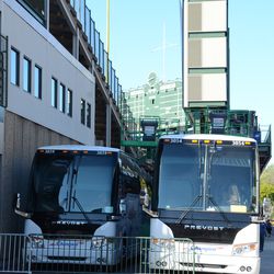 2:44 p.m. Visiting team buses parked outside of Gate A, on Sheffield - 