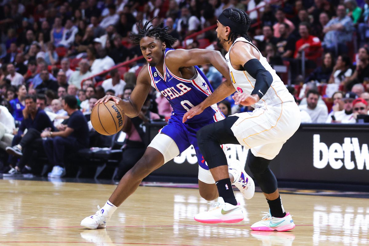 Tyrese Maxey of the Philadelphia 76ers drives against Gabe Vincent #2 of the Miami Heat during the second quarter of the game at Miami-Dade Arena on March 01, 2023 in Miami, Florida. 