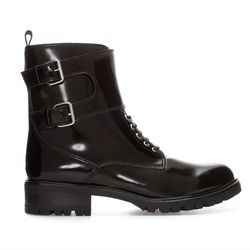 Zara <a href="http://www.zara.com/us/en/woman/shoes/ankle-boots/track-sole-ankle-boot-with-laces-c288001p1494037.html">track sole ankle boot with laces</a>, $99.90.