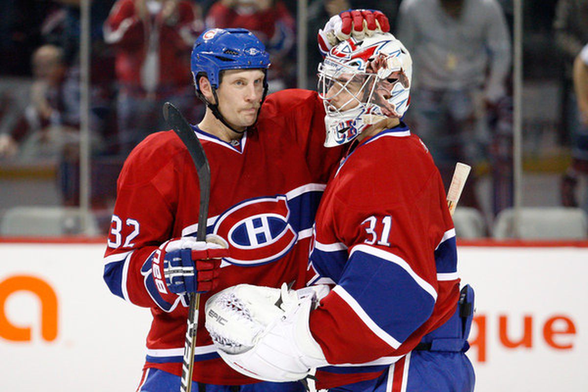 MONTREAL - Current Habs Travis Moen and Carey Price will be joining other past Habs greats for a day of autograph signings at the Brick in Montreal Saturday.  (Photo by Richard Wolowicz/Getty Images)