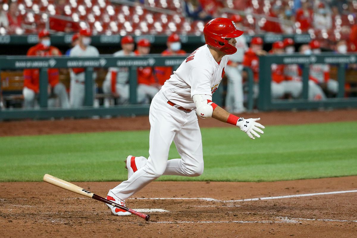 Dylan Carlson of the St. Louis Cardinals follows through on a sacrifice RBI during the ninth inning against the Philadelphia Phillies at Busch Stadium on April 26, 2021 in St Louis, Missouri.