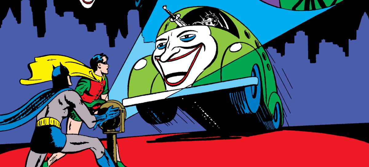 Batman and Robin train a searchlight on the Jokermobile, on the cover of Batman #37, DC Comics (1946). 