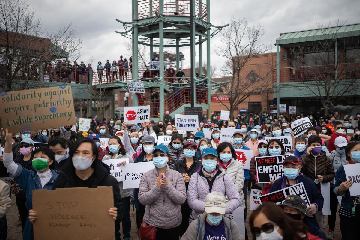 Hundreds of people attend a rally in Chinatown to protest anti-Asian violence, Saturday afternoon, March 27, 2021. The rally happened in the wake of a rise in anti-Asian hate incidents and the shooting in Georgia where a white man killed eight people, six of whom were Asian women.