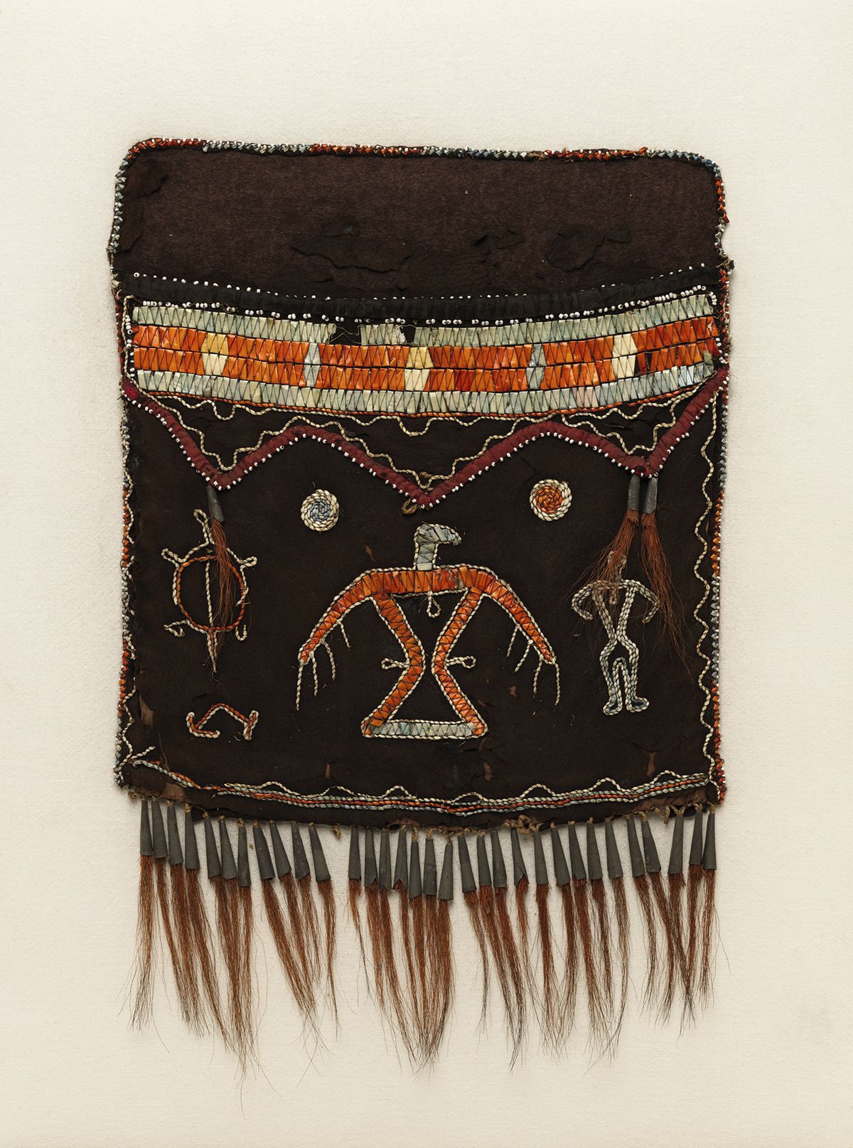 This photo provided by The Metropolitan Museum of Art shows a shoulder bag that is part of the exhibit “Art of Native America: The Charles and Valerie Diker Collection,” which runs through Oct. 6, 2019 at the museum in New York. | Bruce Schwarz/The Metrop