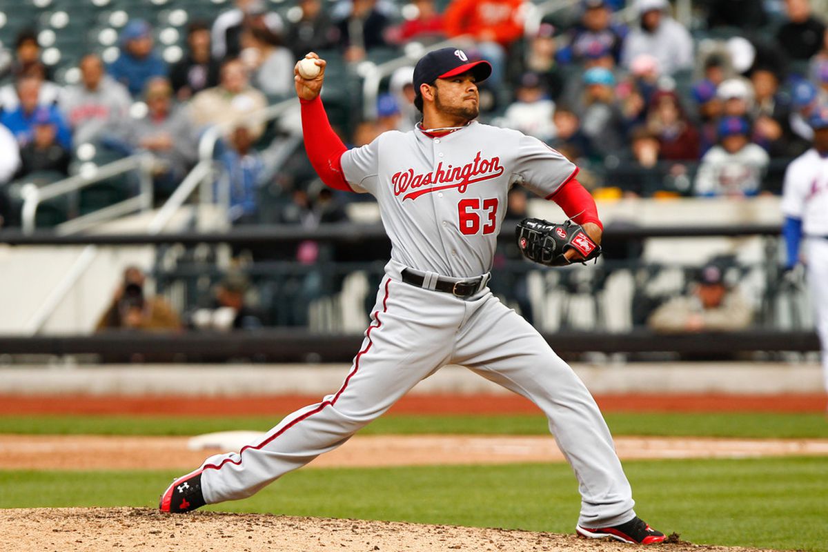 Apr. 11, 2012; Flushing, NY, USA; Washington Nationals relief pitcher Henry Rodriguez (63) pitches during the ninth inning against the New York Mets at Citi Field. Nationals won 4-0. Mandatory Credit: Debby Wong-US PRESSWIRE