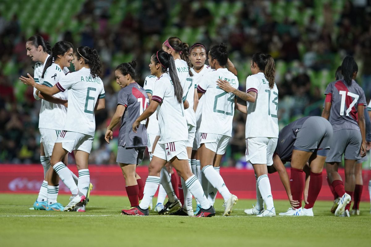 Maricarmen Reyes of Mexico celebrates with teammates after scoring her team’s fifth goal during an international friendly between Mexico and Peru at Corona Stadium on June 25, 2022 in Torreon, Mexico.