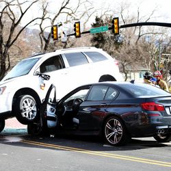 One vehicle rolled on top of another vehicle at the intersection of Foothill and Sunnyside in Salt Lake City on Wednesday, Feb. 4, 2015.  No one was injured.