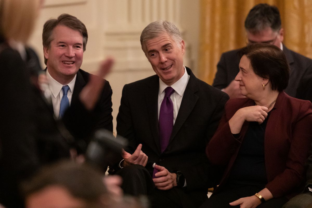 US Supreme Court Associate Justices Brett Kavanaugh, Neil Gorsuch, and Elena Kagan attend the Presidential Medal of Freedom ceremony in the East Room of the White House in Washington, DC, on November 16, 2018.