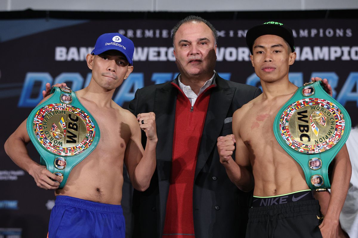 Nonito Donaire, promoter Richard Schaefer and Reymart Gaballo pose during a weigh-in before their fight at the Hyatt Regency LAX on December 10, 2021 in Los Angeles, California.