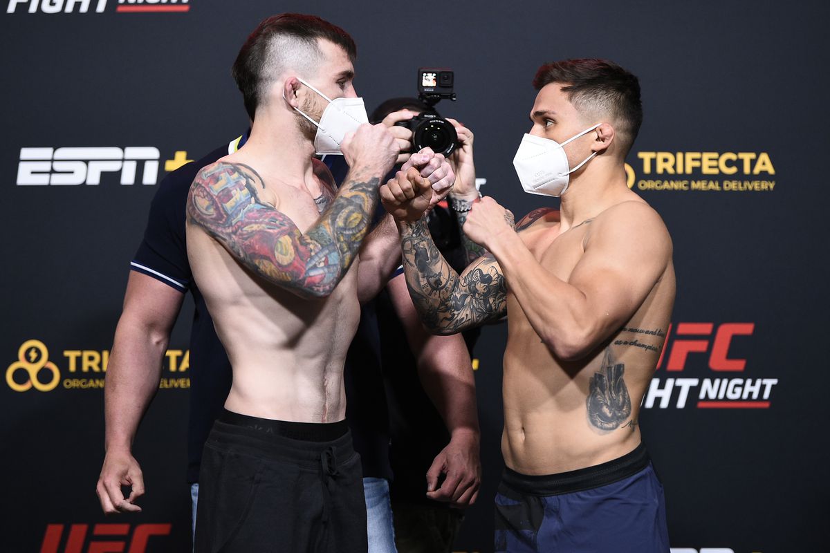 Opponents Darrick Minner and TJ Laramie face off during the UFC Fight Night weigh-in at UFC APEX on September 18, 2020 in Las Vegas, Nevada.