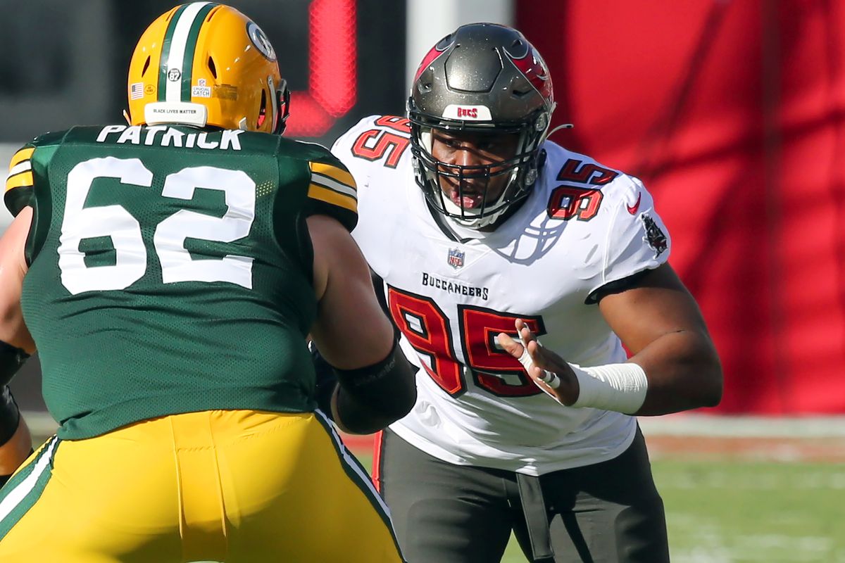 Jeremiah Ledbetter (95) of the Buccaneers rushes the passer during the regular season game between the Green Bay Packers and the Tampa Bay Buccaneers on October 18, 2020 at Raymond James Stadium in Tampa, Florida.