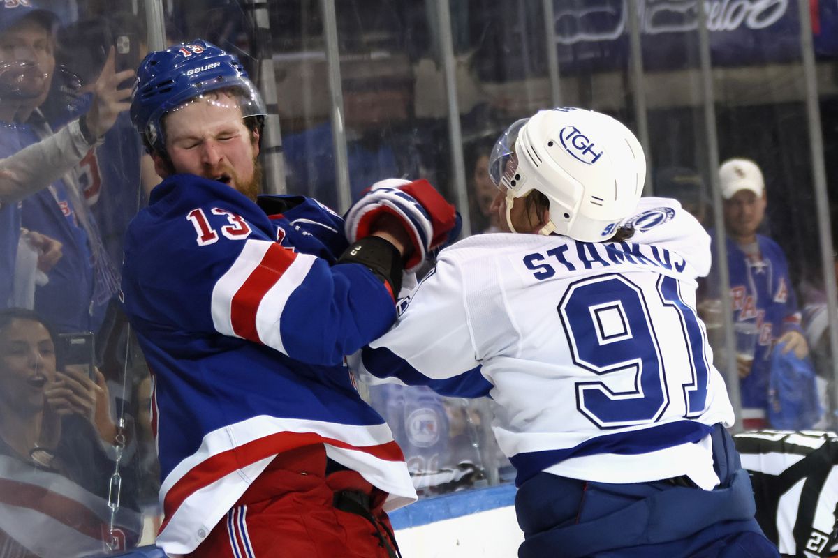 Steven Stamkos #91 of the Tampa Bay Lightning and Alexis Lafreniere #13 of the New York Rangers battle at the end of Game Five of the Eastern Conference Final of the 2022 Stanley Cup Playoffs at Madison Square Garden on June 09, 2022 in New York City.