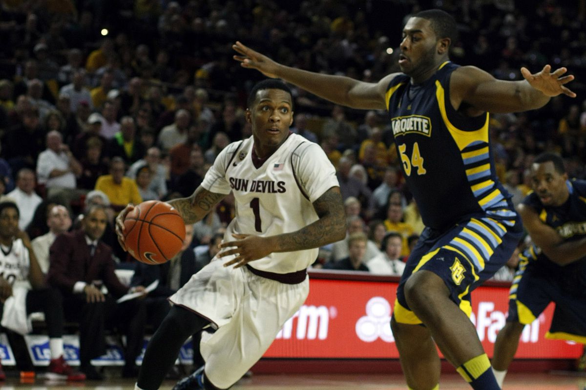 Arizona State's Jahii Carson drives to the basket against Marquette.