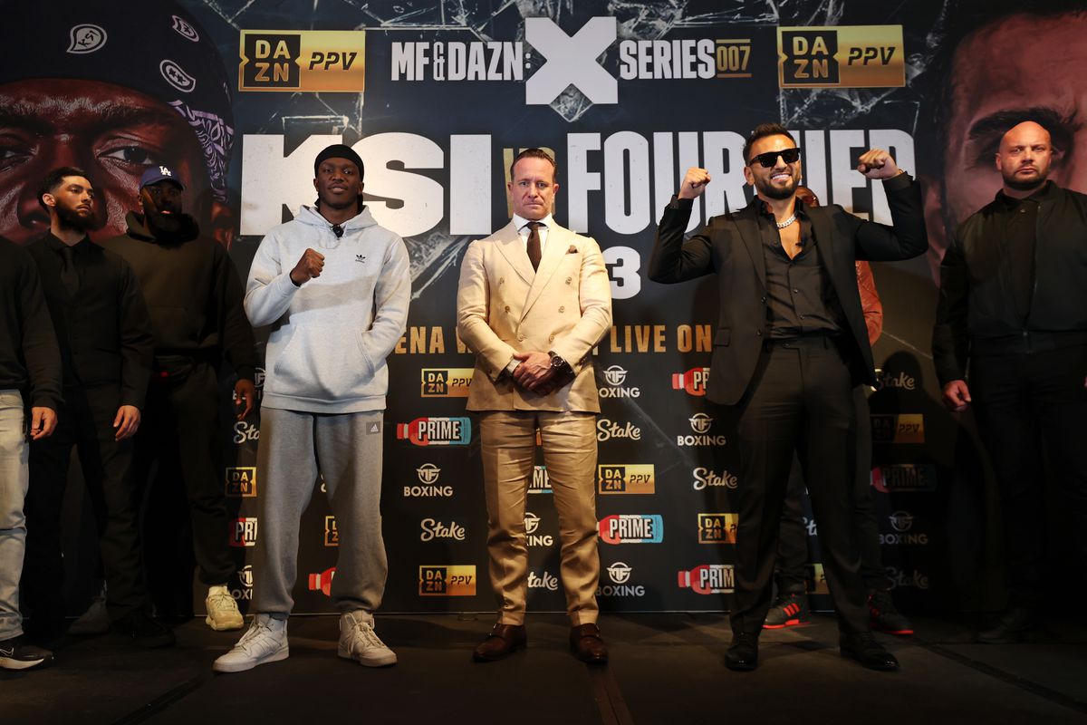 KSI, promoter Kalle Sauerland and Joe Fournier pose for a photo during a press conference ahead of the fight between KSI and Joe Fournier at Glaziers Hall on April 05, 2023 in London, England.