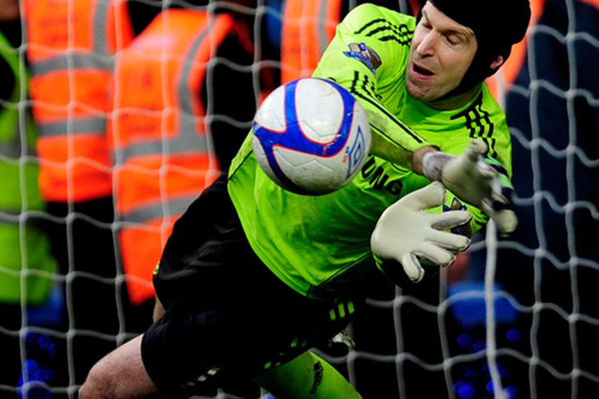Petr Cech of Chelsea saves the penalty of Leighton Baines of Everton in the penalty shootout during the FA Cup sponsored by E.ON 4th round replay match between Chelsea and Everton at Stamford Bridge.