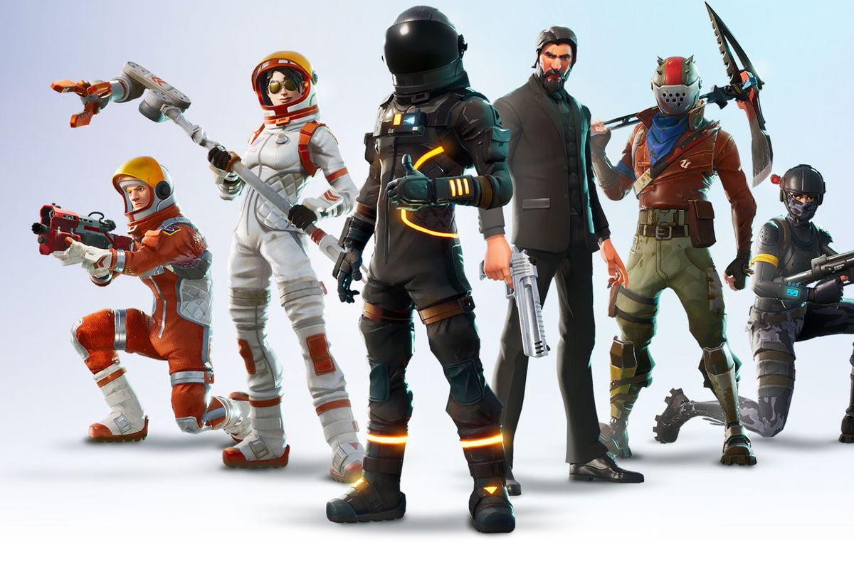 A group of Fortnite characters pose with their weapons.