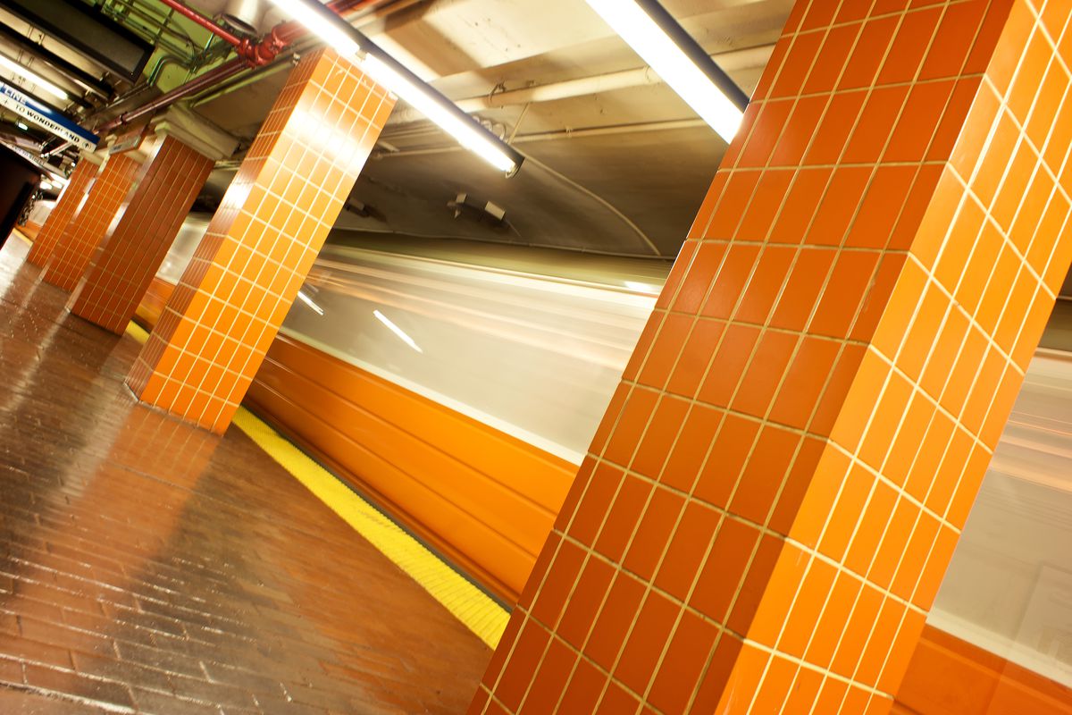 Boston’s Orange Line zipping through a station.
