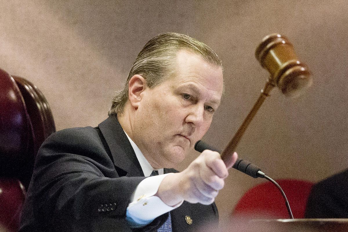 In this Jan. 13, 2015 file photo, Alabama Rep. Mike Hubbard of Auburn, slams down a gavel after he is re-elected speaker of the House during the Alabama Legislature organizational session in Montgomery, Ala.