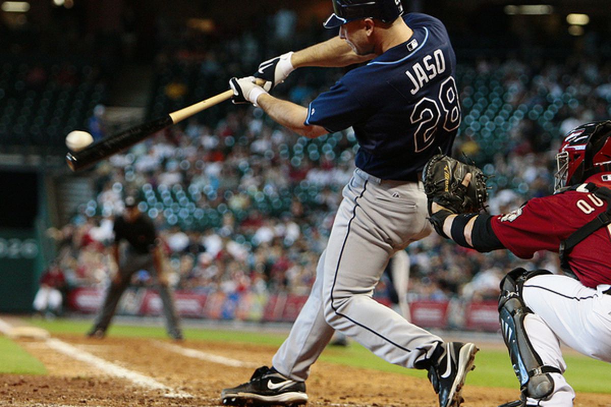 HOUSTON - MAY 23:  John Jaso #28 of the Tampa Bay Rays triples down the first base line in the eighth inning scoring two runs against the Houston Astros on May 23, 2010 in Houston, Texas.  (Photo by Bob Levey/Getty Images)