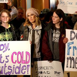 Homeless advocate Ashley Hoope, center left, stands with two homeless mothers — Alixzandra Smallwood and Kimberly Gross — as they join former  Salt Lake City Mayor Rocky Anderson for a protest at the City-County Building in Salt Lake City on Friday, Dec. 9, 2016, calling for more homeless shelter space for those exposed to the winter cold.