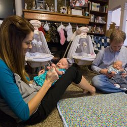 Layne and Bobbisue Christensen with their 6-week-old twins, Ruthann and Martin, at their home in Brigham City on Tuesday, Dec. 29, 2015.