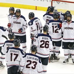 UConn celebrates after their win over Northeastern at the XL Center in Hartford, CT  on November 28, 2017.