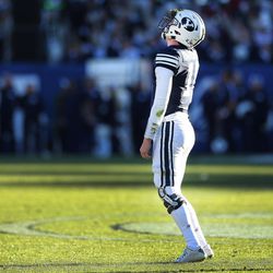Brigham Young Cougars quarterback Joe Critchlow (11) looks upward after getting sacked by Massachusetts in Provo on Saturday, Nov. 18, 2017.