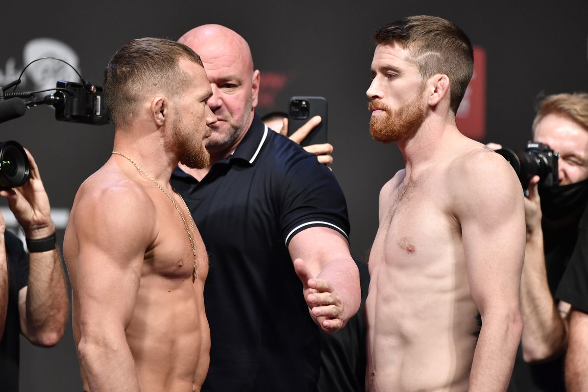 OCTOBER 29: (L-R) Opponents Petr Yan of Russia and Cory Sandhagen face off during the UFC 267 ceremonial weigh-in at Etihad Arena on October 29, 2021 in Yas Island, Abu Dhabi, United Arab Emirates.