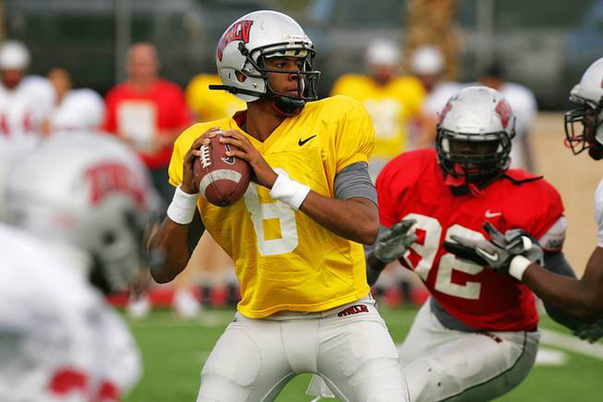 Quarterback Caleb Herring looks for a receiver during UNLV's annual spring intrasquad football game Saturday, April 2, 2011.