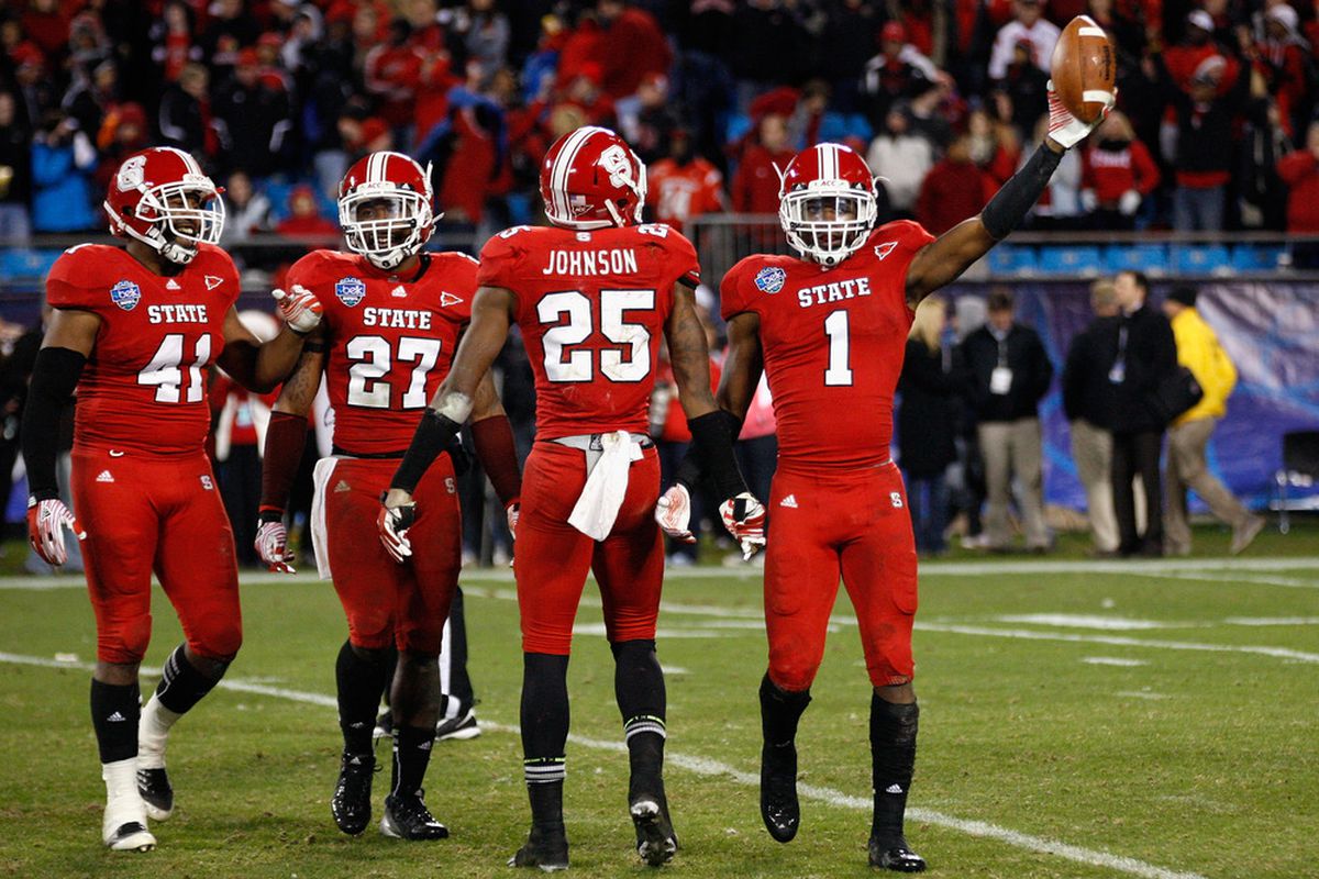 David Amerson is #1 in this photo, #1 in the hearts of NC State fans, and #1 in guys most likely to get burned by Justin Hunter on August 31st. (Photo by Streeter Lecka/Getty Images)